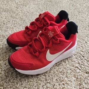Boys Red and White Nike Sneakers